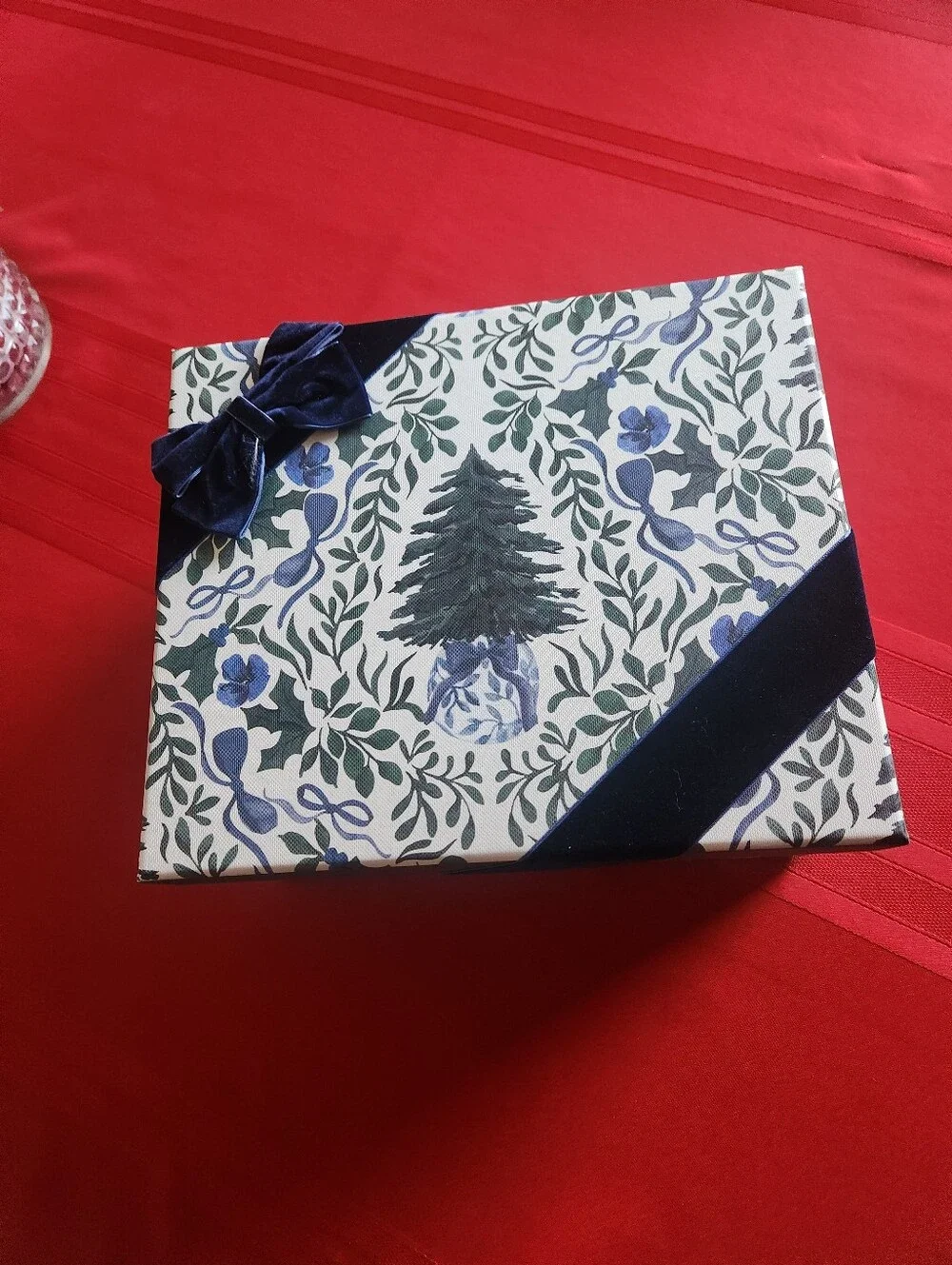 Martha Stewart Christmas gift box with navy and green floral and ribbon design